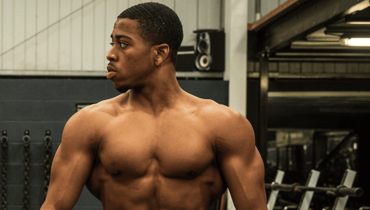 Nathaniel Massiah posing with his chest