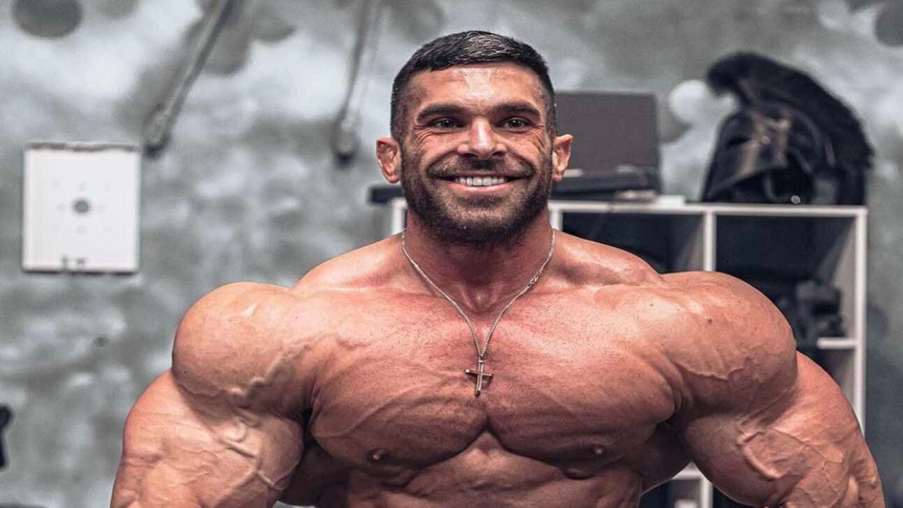 Derek Lunsford smiling with 2021 physique
