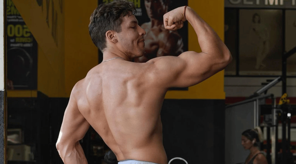 Joseph Baena flexing right arm