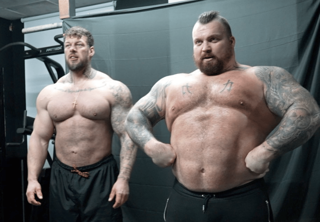 Eddie Hall and Jamie Christian posing in the mirror