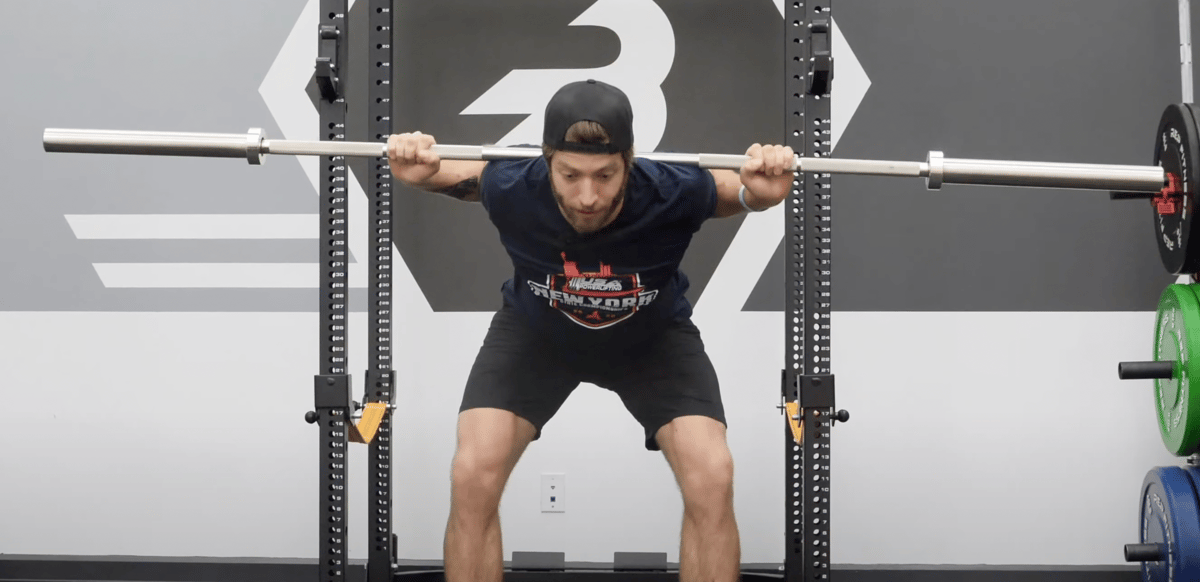 An athlete demonstrates the good morning