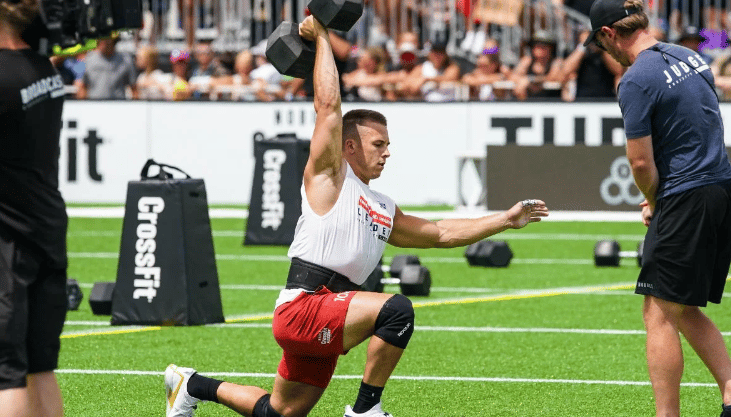 Samuel Cournoyer competing with dumbbell