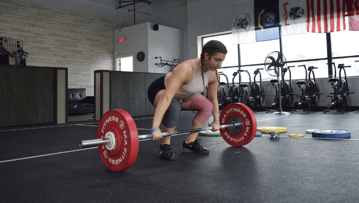 Athlete getting ready with barbell