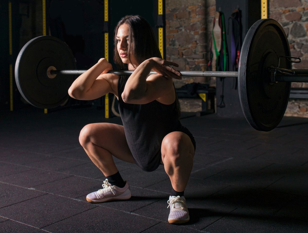 Athlete completing a front squat lockout