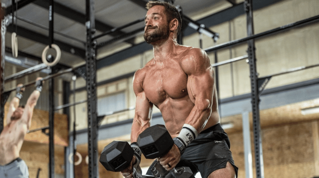 Rich Froning Jr. using dumbbells