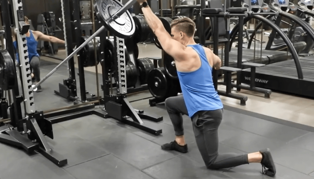 Athlete performs a landmine press
