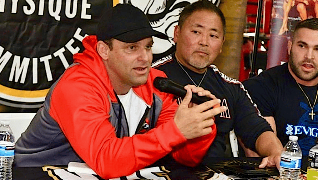 Dan Solomon speaking at a press conference