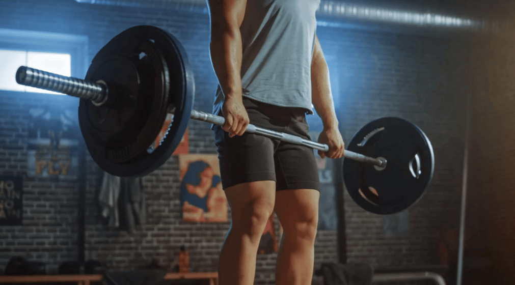 An athlete completing a deadlift pull