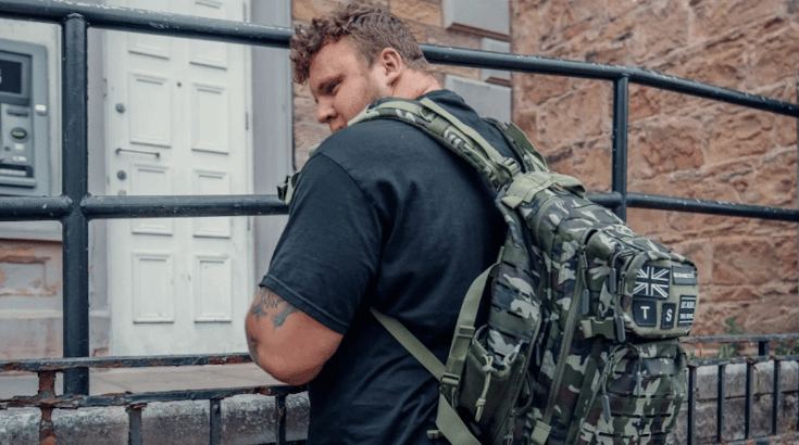 Tom Stoltman with backpack