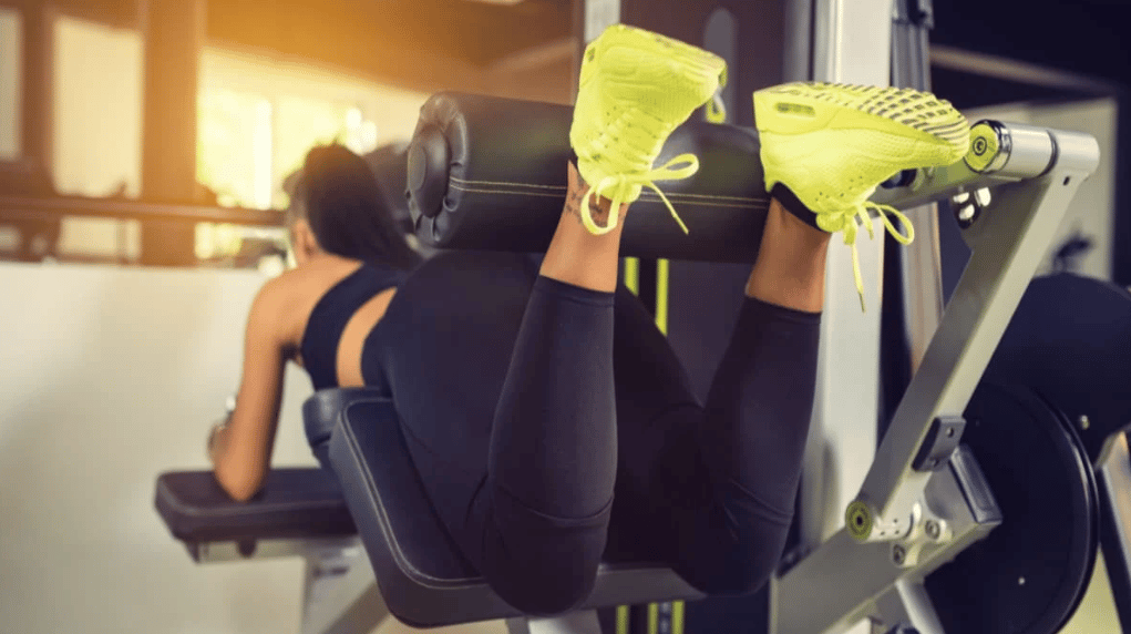 An athlete performs a hamstring curl
