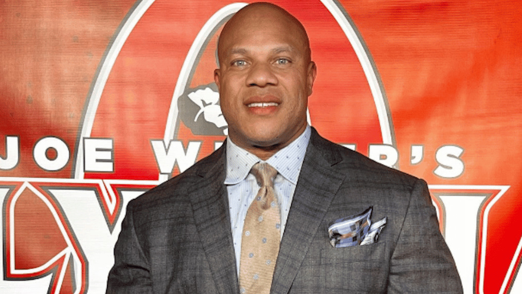 Phil Heath in suit Mr. Olympia