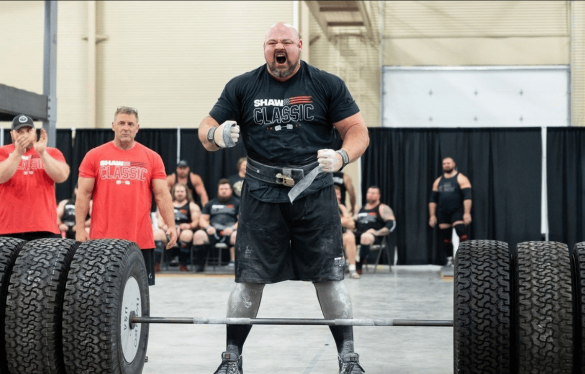 Brian Shaw exclaiming in pride after a tire deadlift