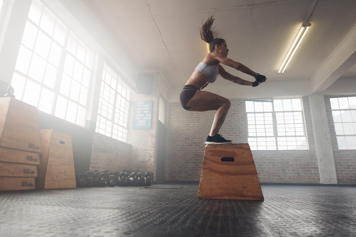 An athlete completes a box jump