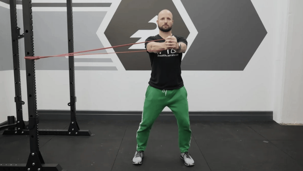 An athlete demonstrates the Pallof press